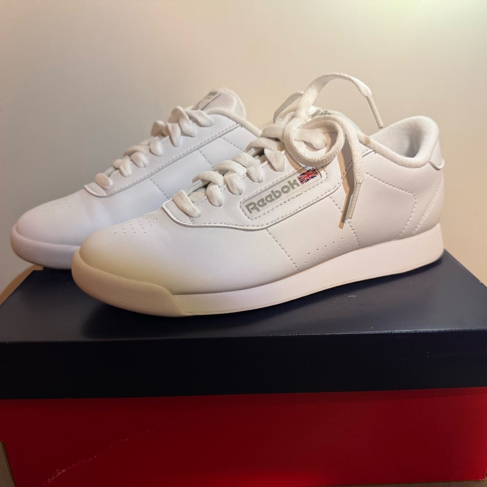 Reebok Classic White Leather Sneakers with Subtle Red/Blue Flag